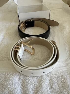 2 Belts. One Black, One White. 95cm. See Pictures For Missing Piece.